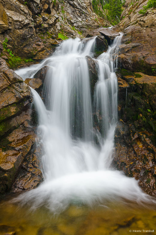 Middle Creek tumbles gracefully over Middle Creek Falls late in the summer outside of Crested Butte, Colorado.