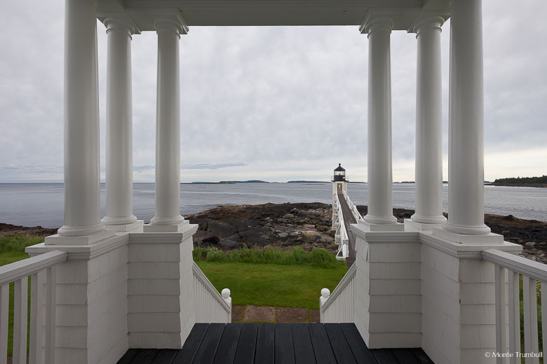 Marshall Point Light is seen from the porch of the lighthouse keeper's house outside of Port Clyde, Maine.