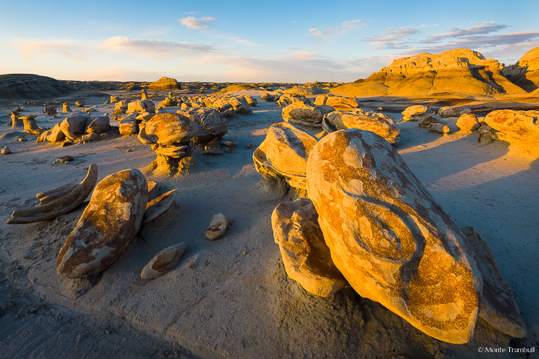 The setting sun highlights the rock formations at the Egg Factory in the Bisti Wilderness Area in New Mexico.