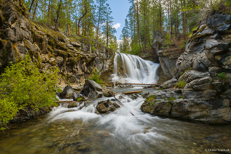 Paulina Creek gracefully flows over McKay Crossing Falls and twists and turns its way through a rocky gorge in Deschutes National Forest in central Oregon.