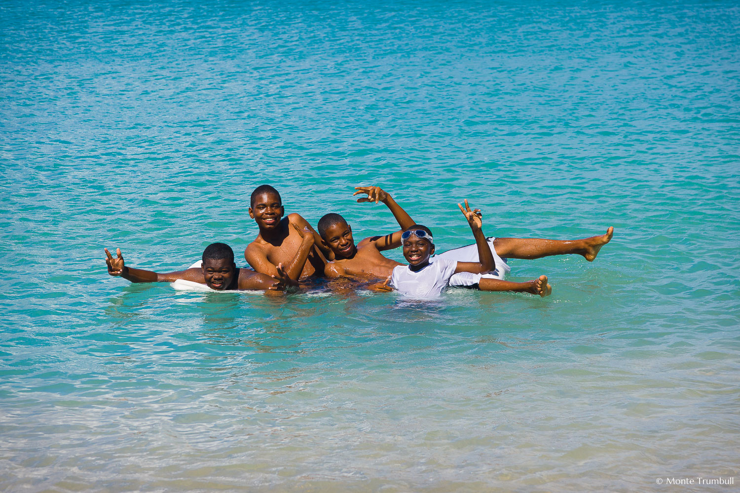 MT-20110212-110431-0146-Anguilla-Lower-Crocus-Bay-local-boys-swimming.jpg